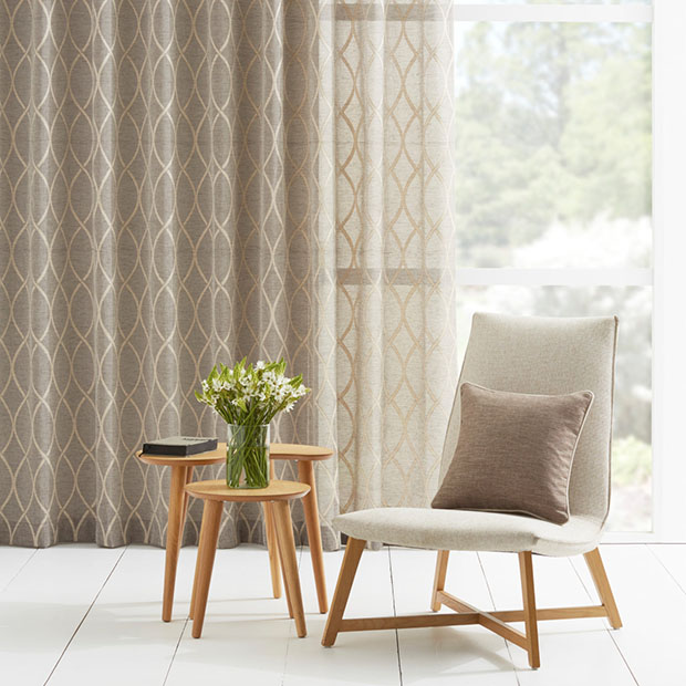 How to use sheer curtains to complete a room